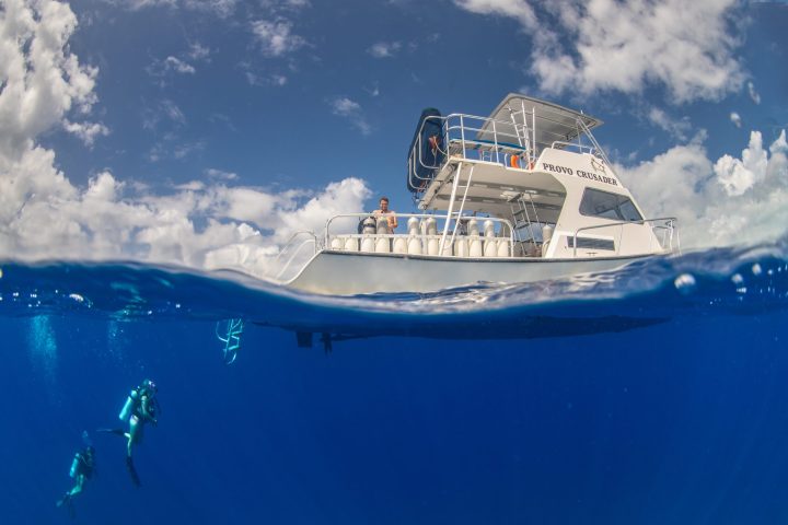 a boat in the blue sky