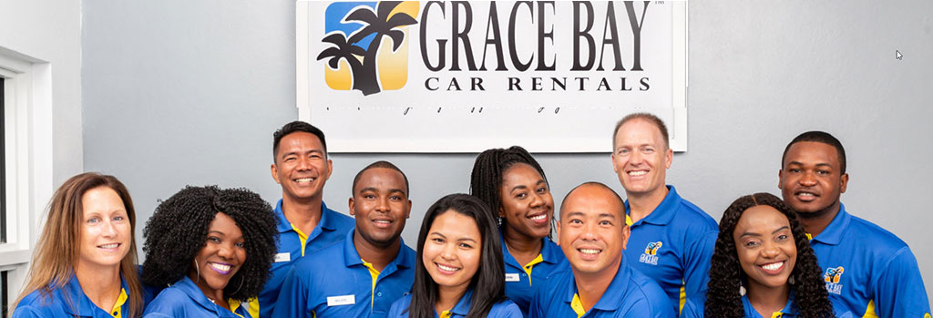 grace-bay-car-rental Susan Mashibe et al. posing for a photo