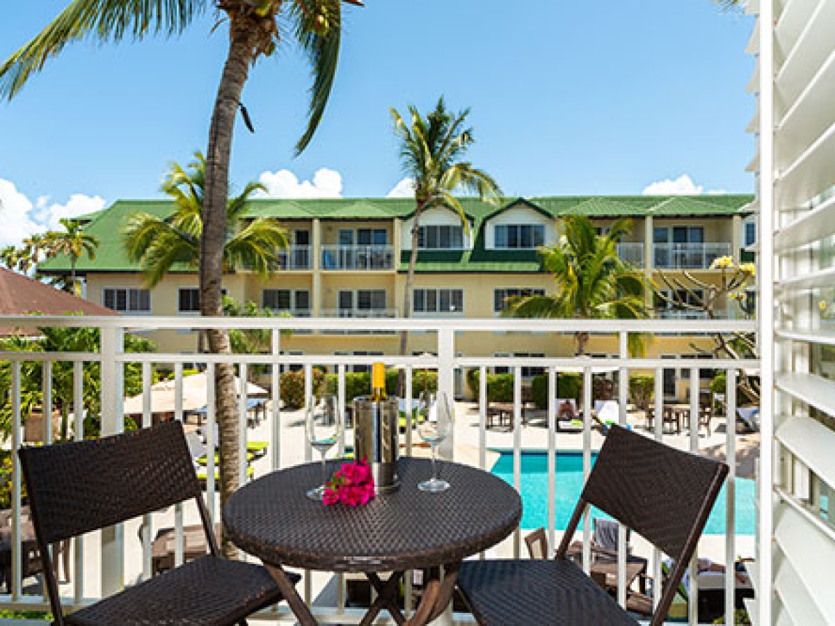 a couple of lawn chairs sitting on top of a table