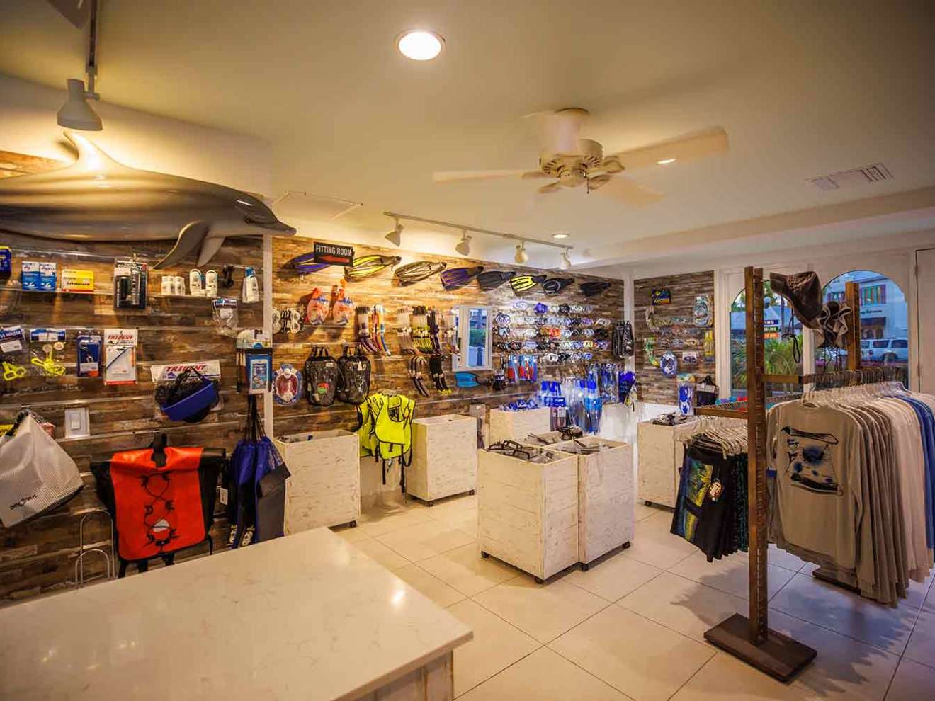 a group of people performing on a counter in a store