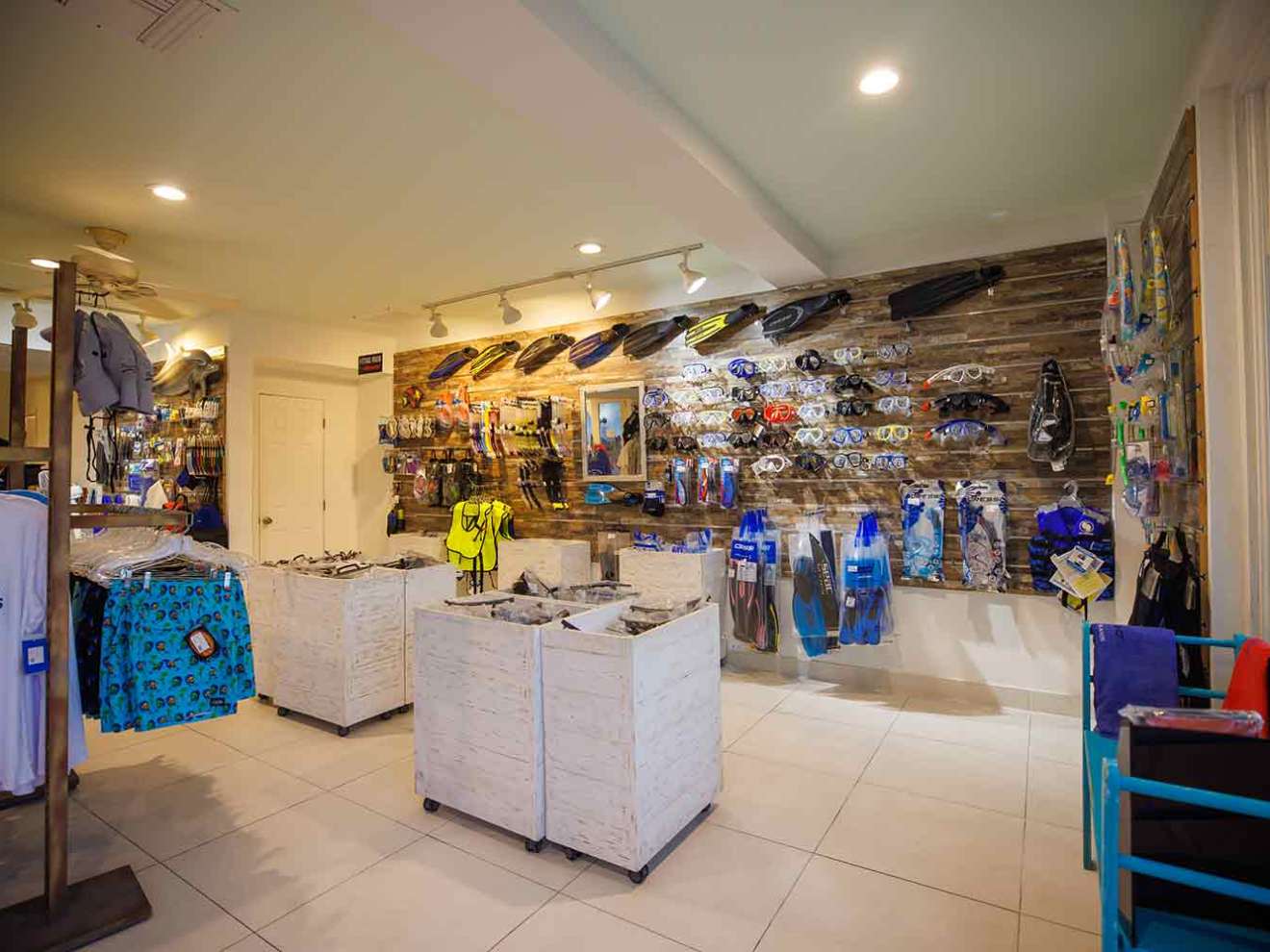 a group of people performing on a counter in a store